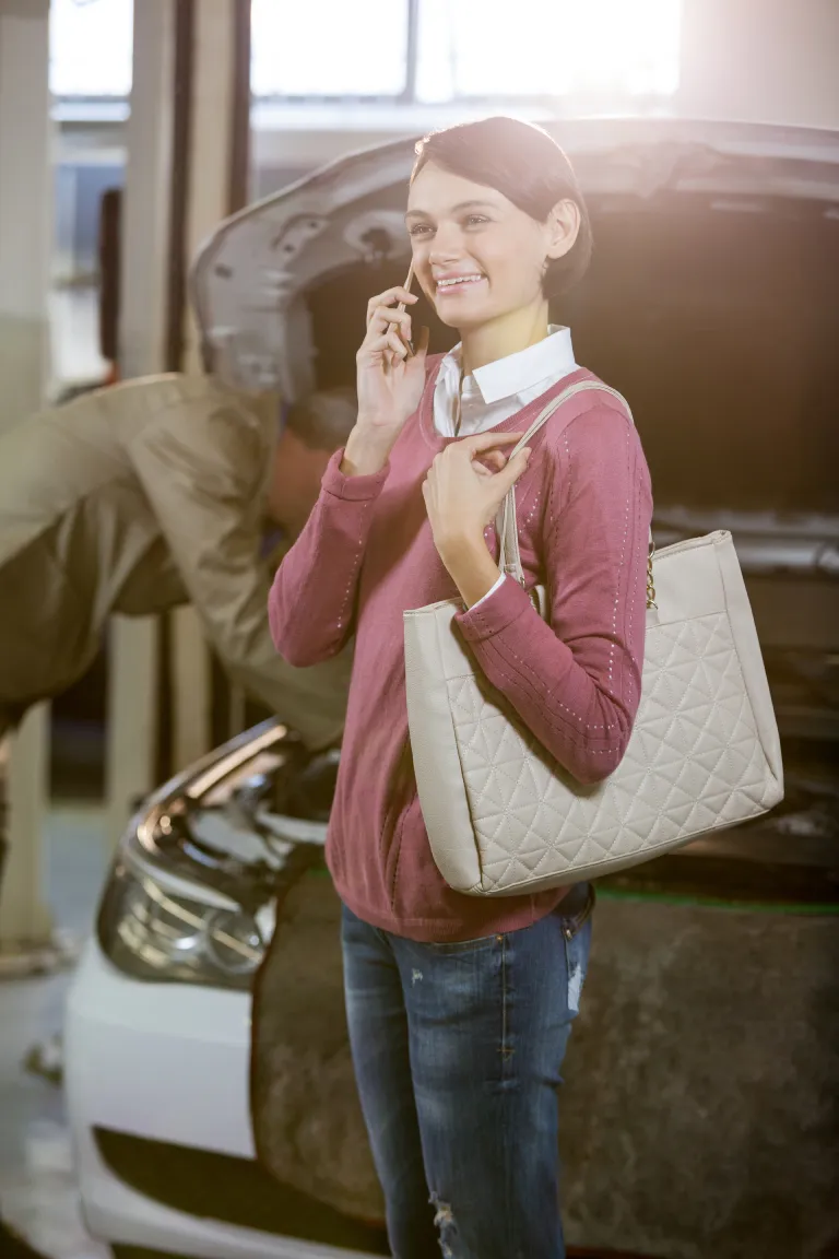 smiling-customer-talking-mobile